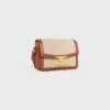 Teen Triomphe Tasche aus Textil und Kalbsleder Teen Triomphe Tasche aus Textil und Kalbsleder