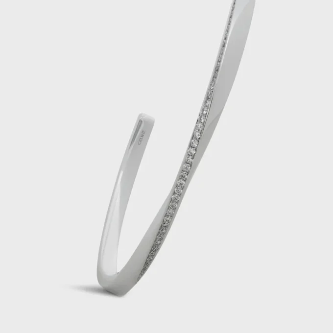 Torsion-Armband aus Weißgold und Diamanten Torsion-Armband aus Weißgold und Diamanten