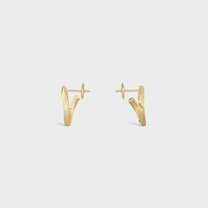 Torsion Ohrringe aus Gelbgold und Diamanten Torsion Ohrringe aus Gelbgold und Diamanten