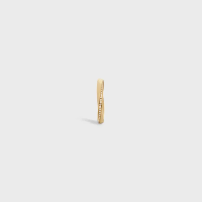 Torsion-Ring aus Gelbgold und Diamanten