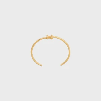 Triomphe Asymmetrische Manschette aus Messing mit Goldfinish