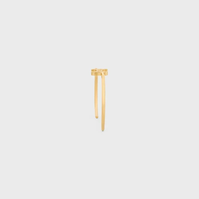 Triomphe Asymmetrische Manschette aus Messing mit Goldfinish Triomphe Asymmetrische Manschette aus Messing mit Goldfinish