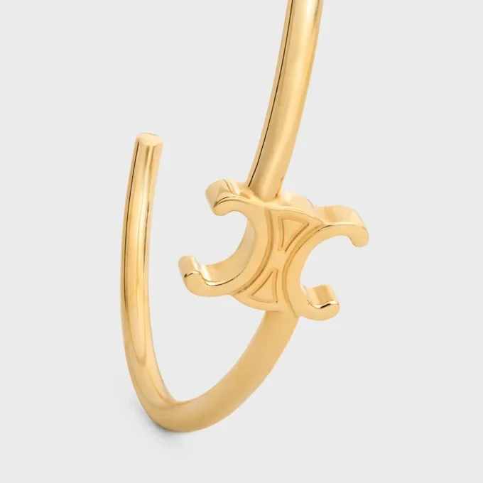 Triomphe Asymmetrische Manschette aus Messing mit Goldfinish Triomphe Asymmetrische Manschette aus Messing mit Goldfinish