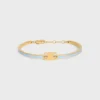 Triomphe-Gelenkarmband aus Emaille und Messing mit Goldfinish Triomphe-Gelenkarmband aus Emaille und Messing mit Goldfinish