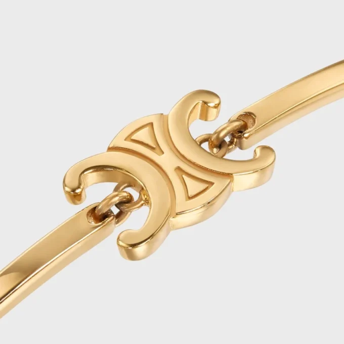 Triomphe-Gelenkarmband aus Messing mit Goldfinish Triomphe-Gelenkarmband aus Messing mit Goldfinish