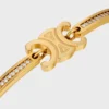 Triomphe Gelenkarmband „Sparkle“ aus Strass und Messing mit Goldfinish Triomphe Gelenkarmband „Sparkle“ aus Strass und Messing mit Goldfinish