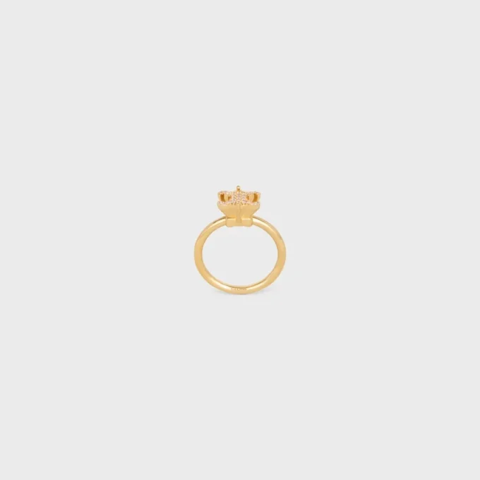 Triomphe Solitaire Sparkle Ring aus Strass und Messing mit Goldfinish Triomphe Solitaire Sparkle Ring aus Strass und Messing mit Goldfinish