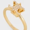 Triomphe Solitaire Sparkle Ring aus Strass und Messing mit Goldfinish Triomphe Solitaire Sparkle Ring aus Strass und Messing mit Goldfinish