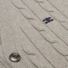 Triomphe-Strickjacke aus Kaschmir mit Zopfmuster