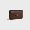 Umschlagbrieftasche an Kette aus Pythonleder Umschlagbrieftasche an Kette aus Pythonleder