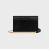 Umschlagbrieftasche mit Kette aus Eidechsenleder
