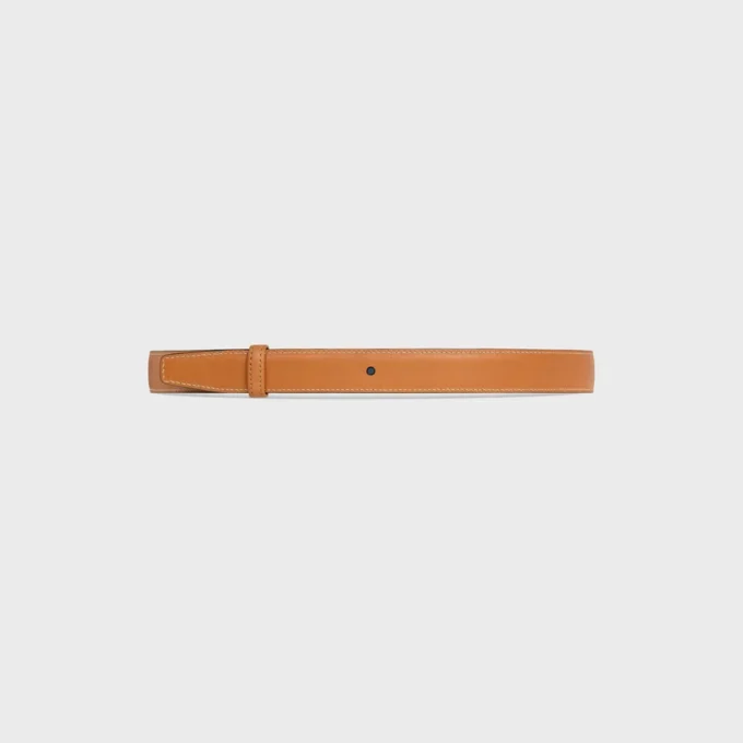 Wendbarer Riemen 25 mm aus Taurillon und naturbelassenem Kalbsleder Wendbarer Riemen 25 mm aus Taurillon und naturbelassenem Kalbsleder